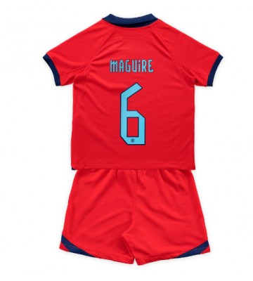 England Harry Maguire #6 Borta Kläder Barn VM 2022 Kortärmad (+ Korta byxor)